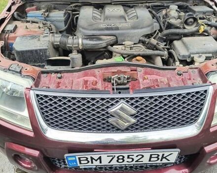 Сузуки Гранд Витара 2007 в Конотопе на Automoto.ua Красный Сузуки Гранд Витара, объемом двигателя 2.7 л и пробегом 176 тыс. км за 5900 $, фото 30 на Automoto.ua