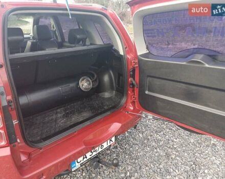 Красный Сузуки Гранд Витара, объемом двигателя 2.39 л и пробегом 100 тыс. км за 10500 $, фото 10 на Automoto.ua