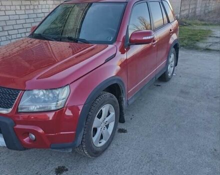 Красный Сузуки Гранд Витара, объемом двигателя 2.39 л и пробегом 171 тыс. км за 13000 $, фото 1 на Automoto.ua