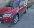 Красный Сузуки Гранд Витара, объемом двигателя 2.39 л и пробегом 171 тыс. км за 13000 $, фото 1 на Automoto.ua