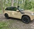 Жовтий Сузукі Гранд Вітара, об'ємом двигуна 2 л та пробігом 325 тис. км за 10037 $, фото 1 на Automoto.ua