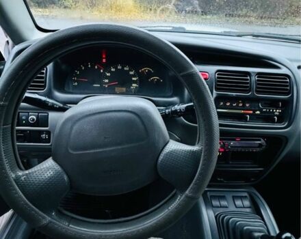 Сірий Сузукі Гранд Вітара, об'ємом двигуна 2 л та пробігом 310 тис. км за 2850 $, фото 9 на Automoto.ua