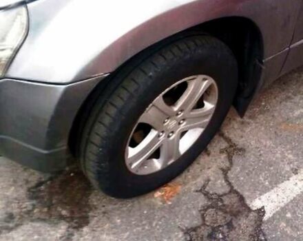 Сірий Сузукі Гранд Вітара, об'ємом двигуна 2 л та пробігом 250 тис. км за 7499 $, фото 2 на Automoto.ua