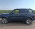Синій Сузукі Гранд Вітара, об'ємом двигуна 2 л та пробігом 320 тис. км за 2600 $, фото 1 на Automoto.ua