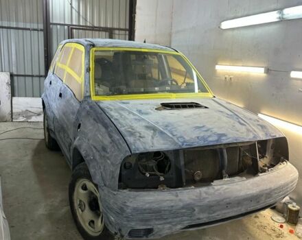 Синій Сузукі Гранд Вітара, об'ємом двигуна 2 л та пробігом 300 тис. км за 4000 $, фото 2 на Automoto.ua