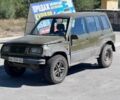 Зелений Сузукі Гранд Вітара, об'ємом двигуна 2 л та пробігом 250 тис. км за 999 $, фото 1 на Automoto.ua