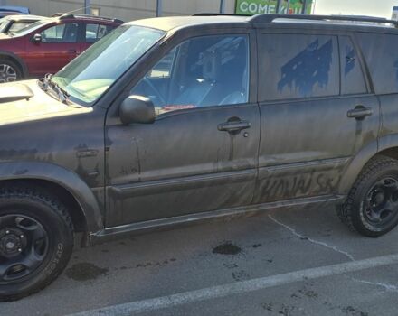 Зеленый Сузуки Гранд Витара, объемом двигателя 2 л и пробегом 297 тыс. км за 5245 $, фото 1 на Automoto.ua