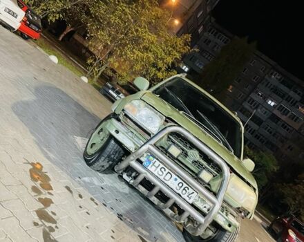 Зелений Сузукі Гранд Вітара, об'ємом двигуна 2 л та пробігом 200 тис. км за 1400 $, фото 2 на Automoto.ua