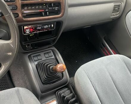 Зелений Сузукі Гранд Вітара, об'ємом двигуна 2.7 л та пробігом 184 тис. км за 3600 $, фото 13 на Automoto.ua