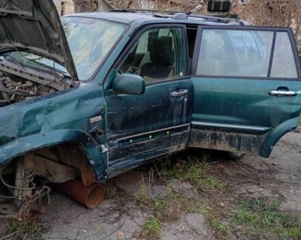 Зелений Сузукі Гранд Вітара, об'ємом двигуна 2.5 л та пробігом 2 тис. км за 1000 $, фото 1 на Automoto.ua