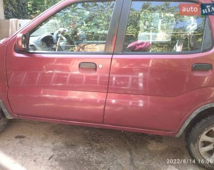Красный Сузуки Игнис, объемом двигателя 1.33 л и пробегом 320 тыс. км за 1900 $, фото 10 на Automoto.ua