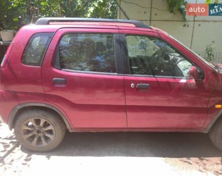 Красный Сузуки Игнис, объемом двигателя 1.33 л и пробегом 320 тыс. км за 1900 $, фото 11 на Automoto.ua