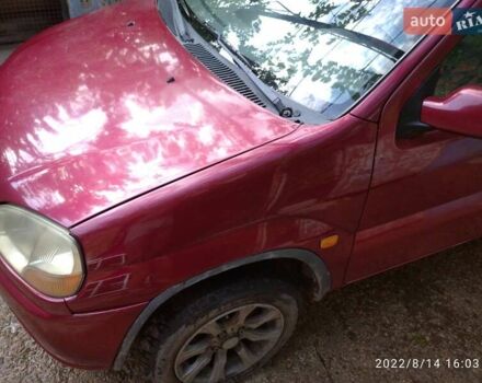 Красный Сузуки Игнис, объемом двигателя 1.33 л и пробегом 320 тыс. км за 1900 $, фото 6 на Automoto.ua