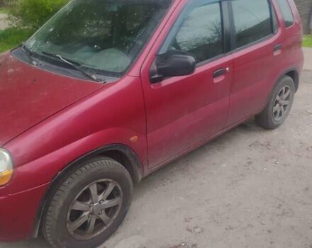 Красный Сузуки Игнис, объемом двигателя 1.3 л и пробегом 100 тыс. км за 1000 $, фото 2 на Automoto.ua