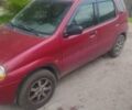 Красный Сузуки Игнис, объемом двигателя 1.3 л и пробегом 100 тыс. км за 1000 $, фото 2 на Automoto.ua