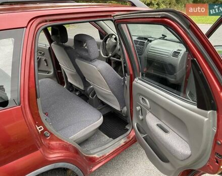 Красный Сузуки Игнис, объемом двигателя 1.3 л и пробегом 180 тыс. км за 4500 $, фото 11 на Automoto.ua