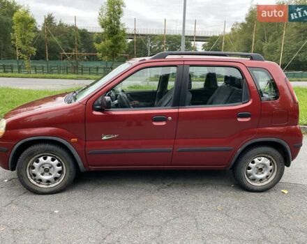 Красный Сузуки Игнис, объемом двигателя 1.3 л и пробегом 180 тыс. км за 4500 $, фото 1 на Automoto.ua