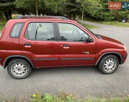 Красный Сузуки Игнис, объемом двигателя 1.3 л и пробегом 180 тыс. км за 4500 $, фото 3 на Automoto.ua