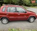 Красный Сузуки Игнис, объемом двигателя 1.3 л и пробегом 180 тыс. км за 4500 $, фото 3 на Automoto.ua