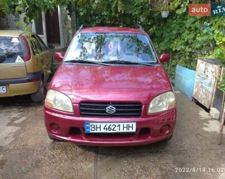 Красный Сузуки Игнис, объемом двигателя 1.33 л и пробегом 320 тыс. км за 1900 $, фото 1 на Automoto.ua