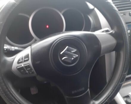 Серый Сузуки Игнис, объемом двигателя 1.9 л и пробегом 250 тыс. км за 8300 $, фото 4 на Automoto.ua