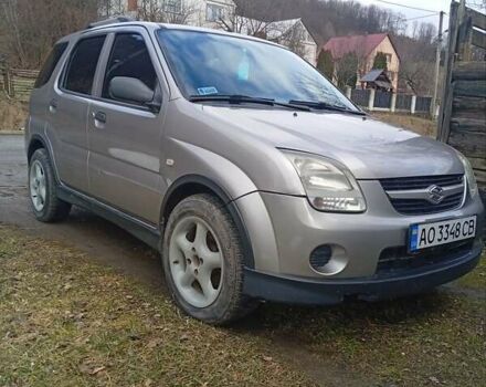 Серый Сузуки Игнис, объемом двигателя 1.25 л и пробегом 383 тыс. км за 4750 $, фото 1 на Automoto.ua