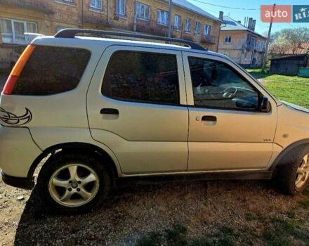 Серый Сузуки Игнис, объемом двигателя 1.33 л и пробегом 400 тыс. км за 2000 $, фото 1 на Automoto.ua