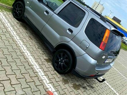 Серый Сузуки Игнис, объемом двигателя 1.3 л и пробегом 253 тыс. км за 2800 $, фото 1 на Automoto.ua