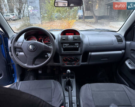 Синий Сузуки Игнис, объемом двигателя 1.3 л и пробегом 282 тыс. км за 4100 $, фото 5 на Automoto.ua