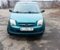 Зеленый Сузуки Игнис, объемом двигателя 1.33 л и пробегом 237 тыс. км за 2900 $, фото 1 на Automoto.ua