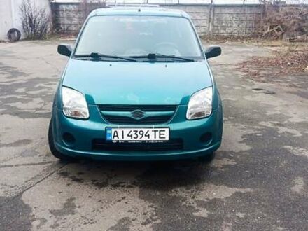 Зеленый Сузуки Игнис, объемом двигателя 1.33 л и пробегом 237 тыс. км за 3200 $, фото 1 на Automoto.ua