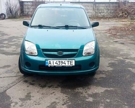Зеленый Сузуки Игнис, объемом двигателя 1.33 л и пробегом 237 тыс. км за 3200 $, фото 1 на Automoto.ua