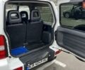 Білий Сузукі Джімні, об'ємом двигуна 1.3 л та пробігом 81 тис. км за 9300 $, фото 10 на Automoto.ua