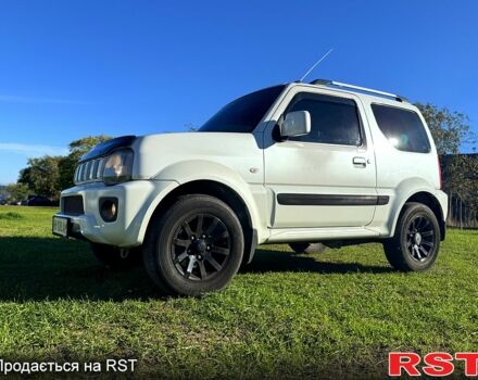 Сузуки Джимни 2012 в Черноморске (Ильичевске) на Automoto.ua Белый Сузуки Джимни, объемом двигателя 1.3 л и пробегом 70 тыс. км за 13400 $, фото 11 на Automoto.ua