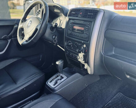 Белый Сузуки Джимни, объемом двигателя 1.33 л и пробегом 87 тыс. км за 13800 $, фото 13 на Automoto.ua