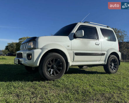 Білий Сузукі Джімні, об'ємом двигуна 1.33 л та пробігом 72 тис. км за 13400 $, фото 11 на Automoto.ua