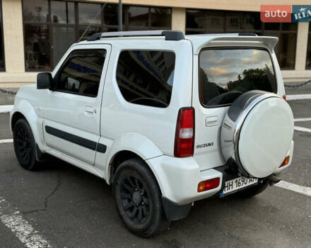 Білий Сузукі Джімні, об'ємом двигуна 1.33 л та пробігом 72 тис. км за 13400 $, фото 31 на Automoto.ua