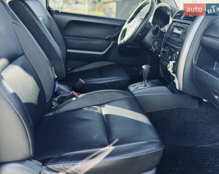 Белый Сузуки Джимни, объемом двигателя 1.33 л и пробегом 87 тыс. км за 13800 $, фото 12 на Automoto.ua