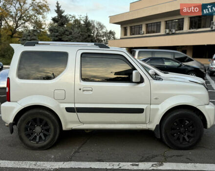 Белый Сузуки Джимни, объемом двигателя 1.33 л и пробегом 87 тыс. км за 13800 $, фото 6 на Automoto.ua