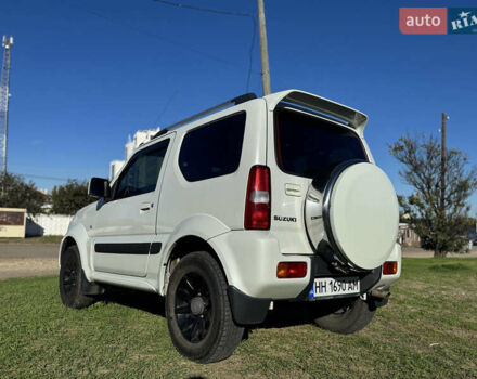 Білий Сузукі Джімні, об'ємом двигуна 1.33 л та пробігом 72 тис. км за 13400 $, фото 12 на Automoto.ua