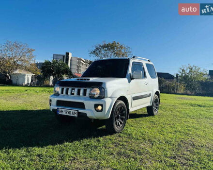 Білий Сузукі Джімні, об'ємом двигуна 1.33 л та пробігом 72 тис. км за 13400 $, фото 9 на Automoto.ua