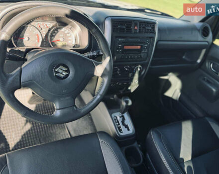 Білий Сузукі Джімні, об'ємом двигуна 1.33 л та пробігом 72 тис. км за 13400 $, фото 20 на Automoto.ua