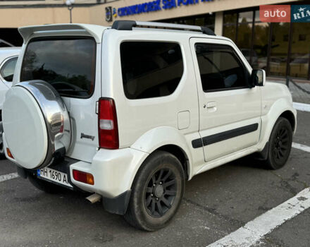 Белый Сузуки Джимни, объемом двигателя 1.33 л и пробегом 87 тыс. км за 13800 $, фото 4 на Automoto.ua