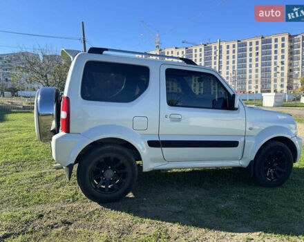 Белый Сузуки Джимни, объемом двигателя 1.33 л и пробегом 87 тыс. км за 13800 $, фото 24 на Automoto.ua