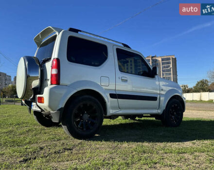 Білий Сузукі Джімні, об'ємом двигуна 1.33 л та пробігом 72 тис. км за 13400 $, фото 13 на Automoto.ua