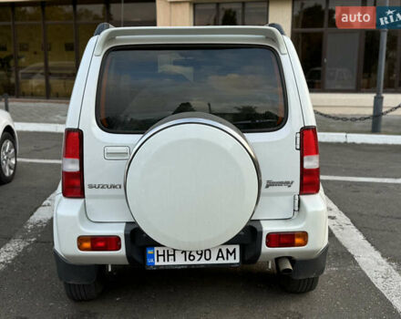Білий Сузукі Джімні, об'ємом двигуна 1.33 л та пробігом 72 тис. км за 13400 $, фото 30 на Automoto.ua