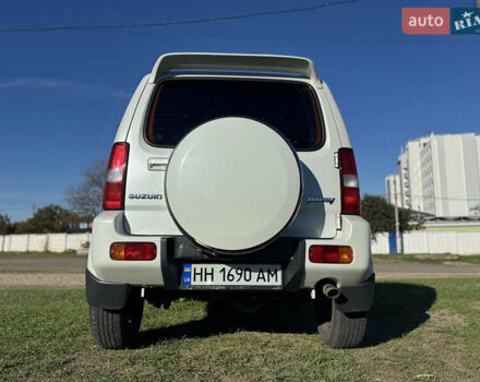 Білий Сузукі Джімні, об'ємом двигуна 1.33 л та пробігом 72 тис. км за 13400 $, фото 7 на Automoto.ua