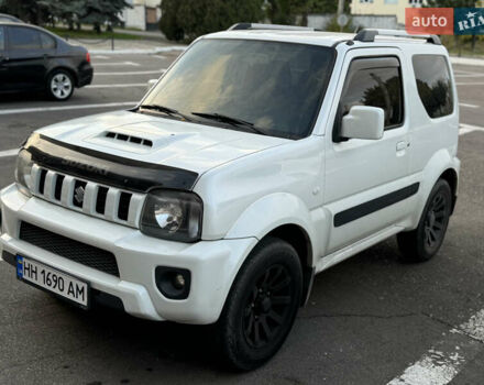Білий Сузукі Джімні, об'ємом двигуна 1.33 л та пробігом 72 тис. км за 13400 $, фото 27 на Automoto.ua