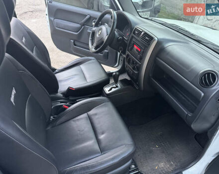 Белый Сузуки Джимни, объемом двигателя 1.33 л и пробегом 87 тыс. км за 13800 $, фото 7 на Automoto.ua