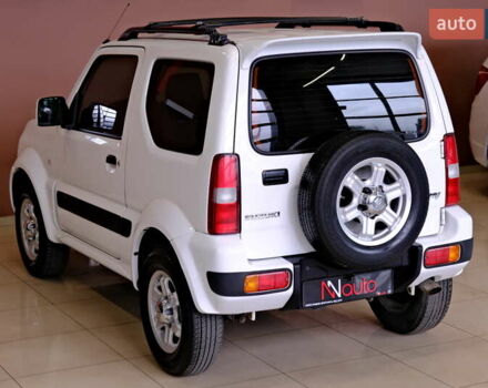 Білий Сузукі Джімні, об'ємом двигуна 1.3 л та пробігом 122 тис. км за 14900 $, фото 14 на Automoto.ua